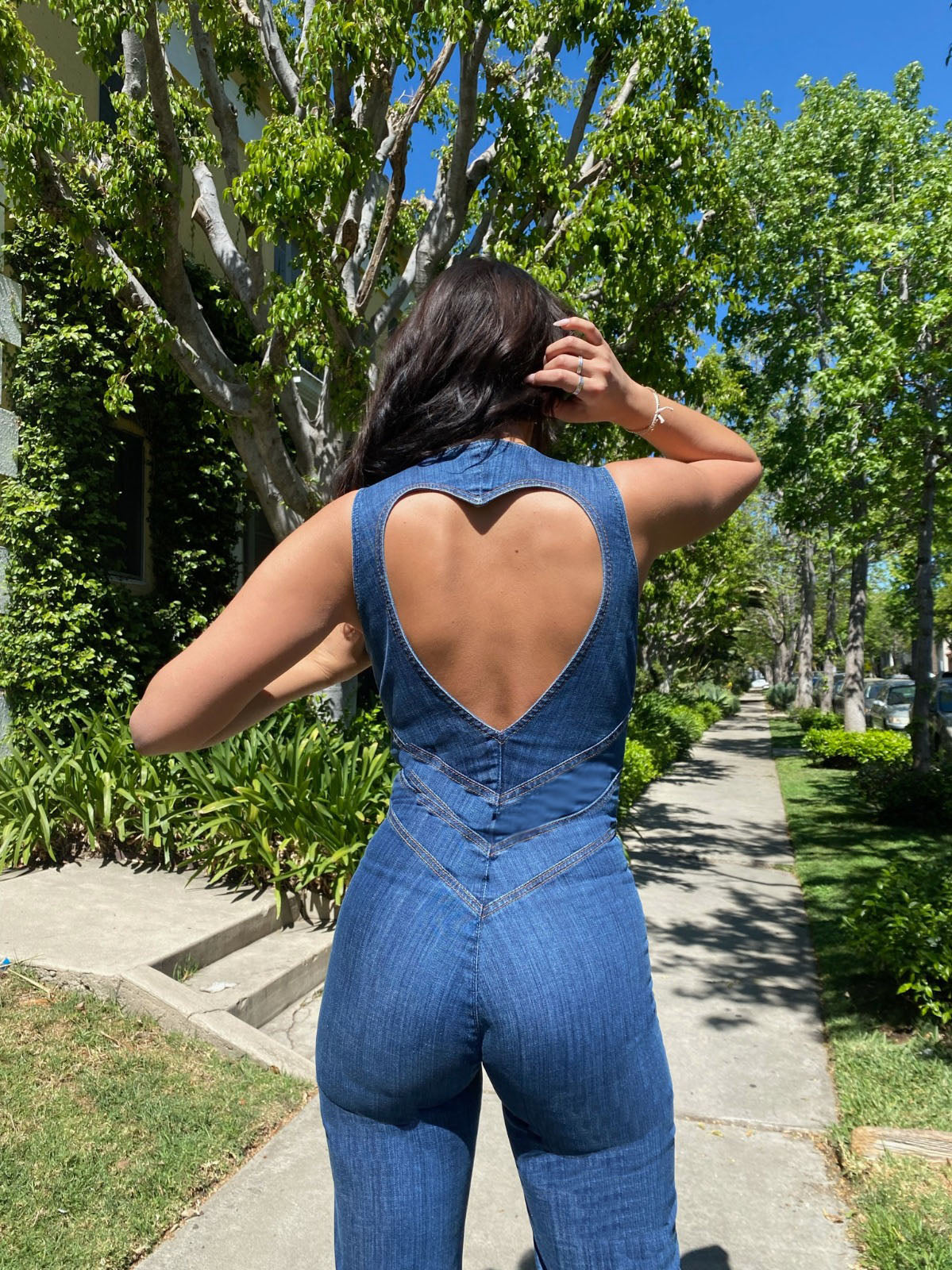 Women's Denim Jumpsuit - Sleeveless Flared Leg Heart Back Cutout
