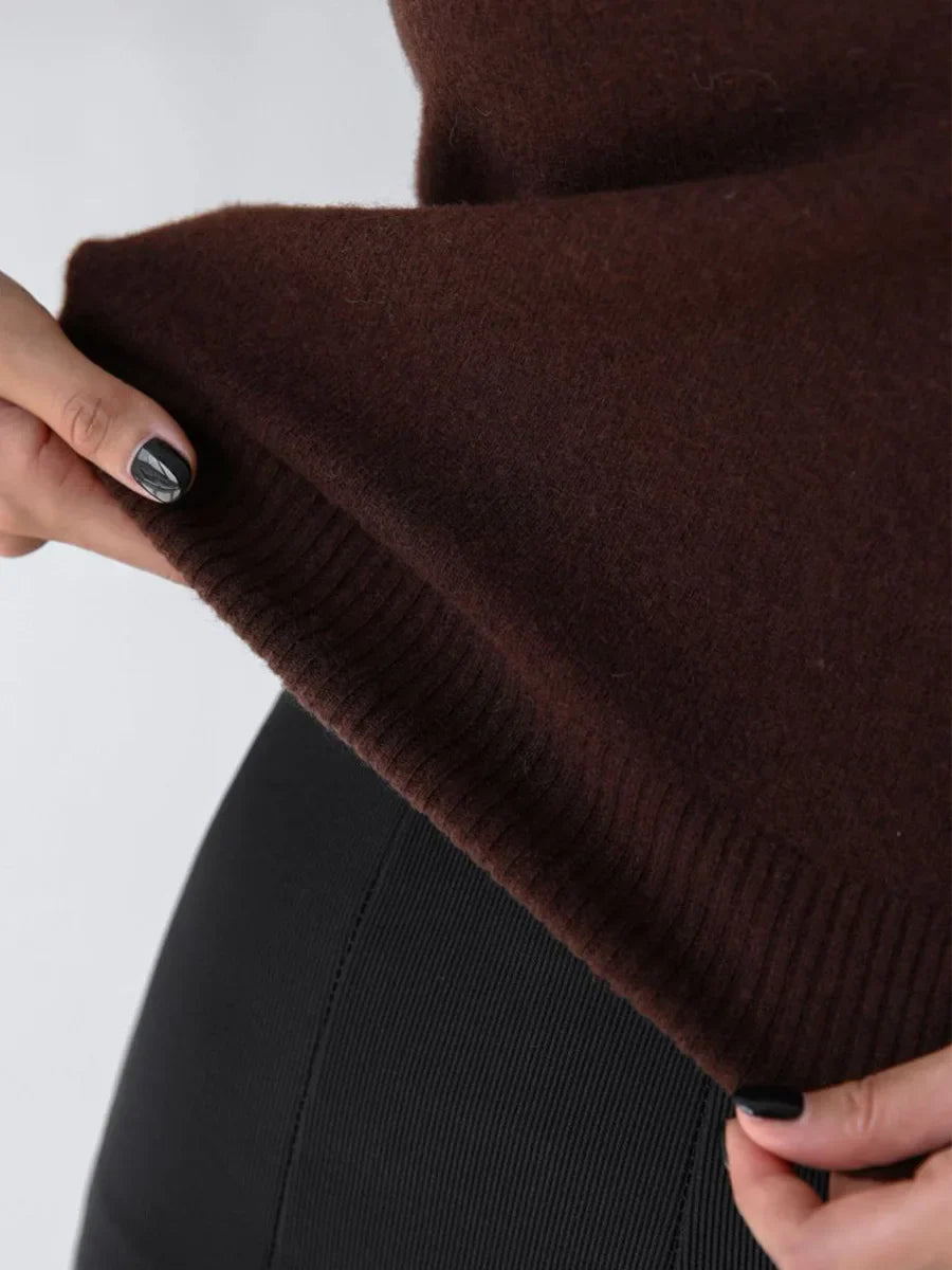 Women’s Sleeveless High Neck Knitted Vest with Ribbed Hem and Fitted Silhouette