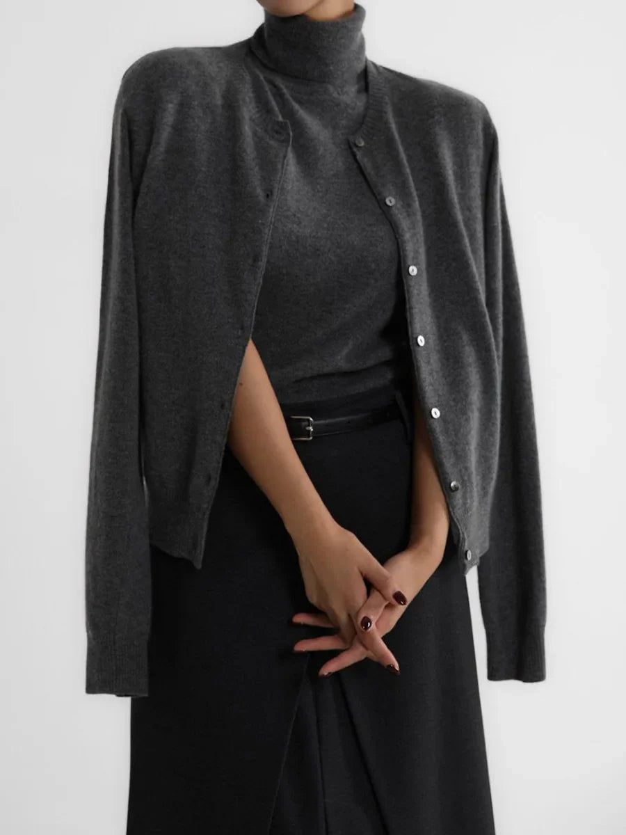 Women’s Sleeveless High Neck Knitted Vest with Ribbed Hem and Fitted Silhouette