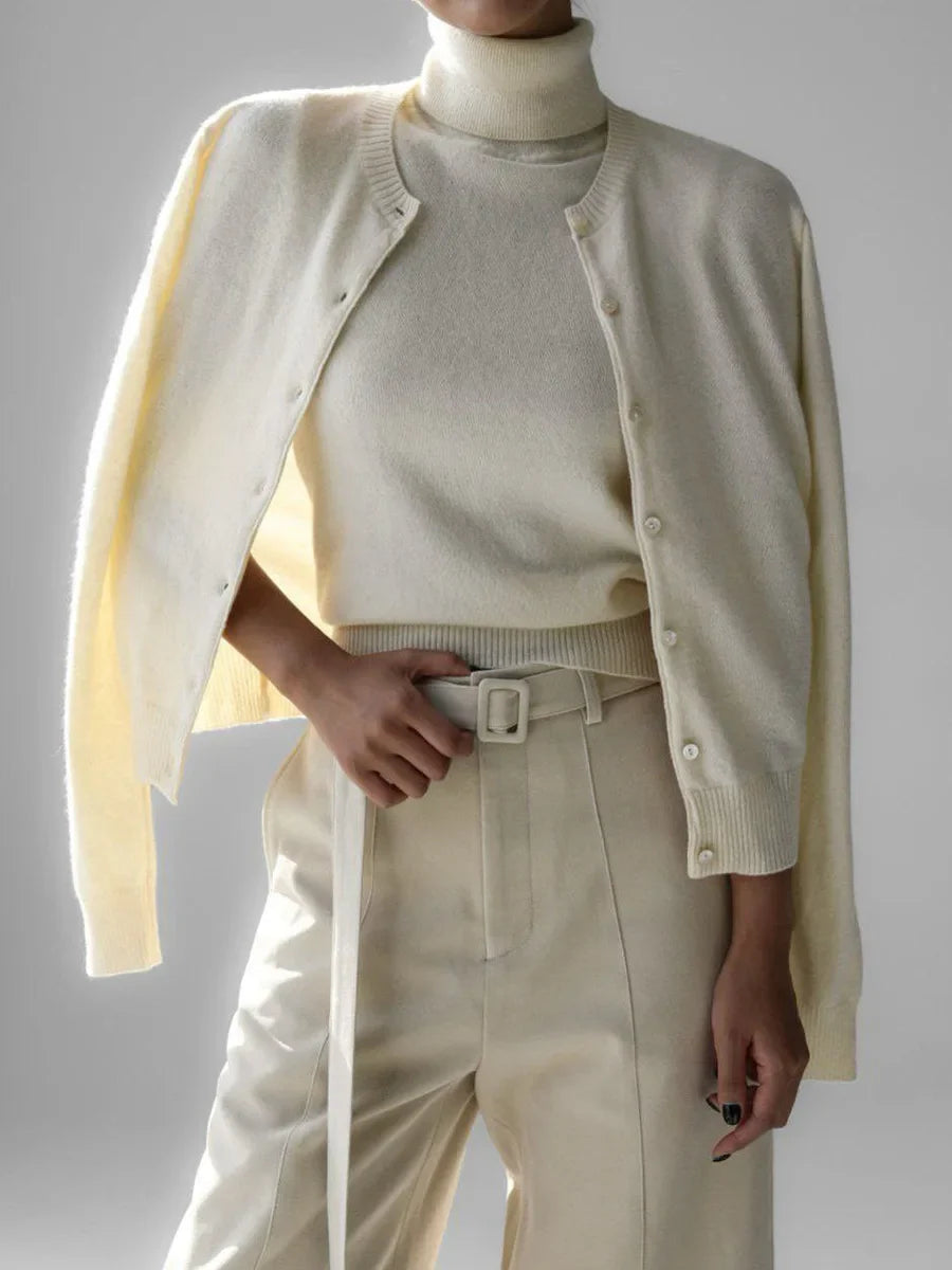 Women’s Sleeveless High Neck Knitted Vest with Ribbed Hem and Fitted Silhouette